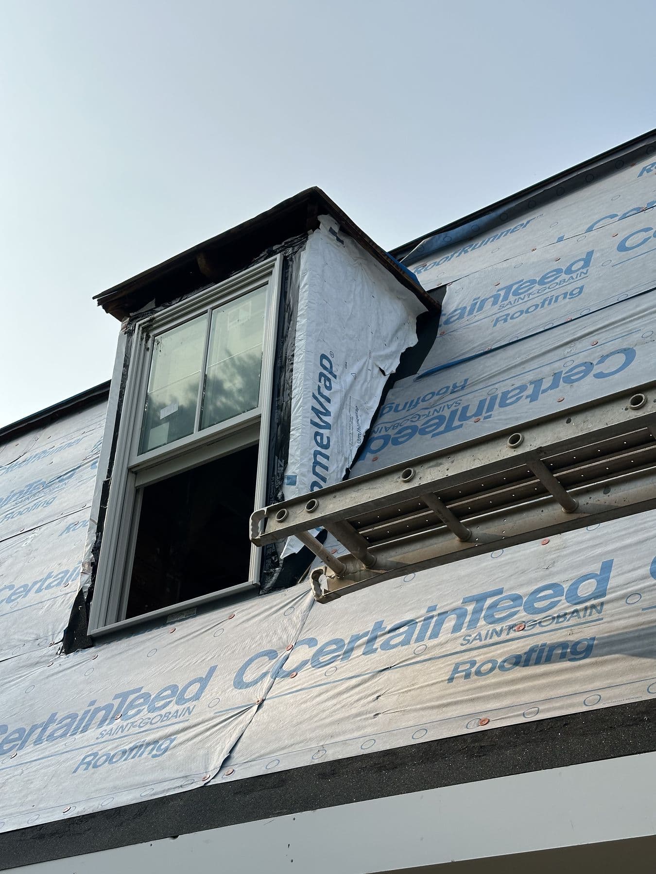 Side view of a new dormer showing the flashing and wrapped cheek wall