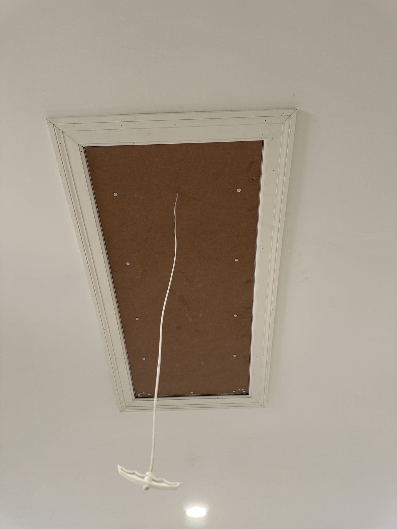 Ceiling hatch opening framed for a pull-down stair